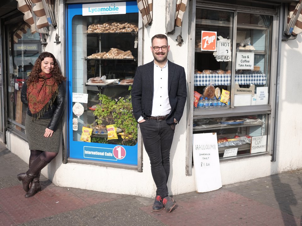 Petros and Anna outside shop front